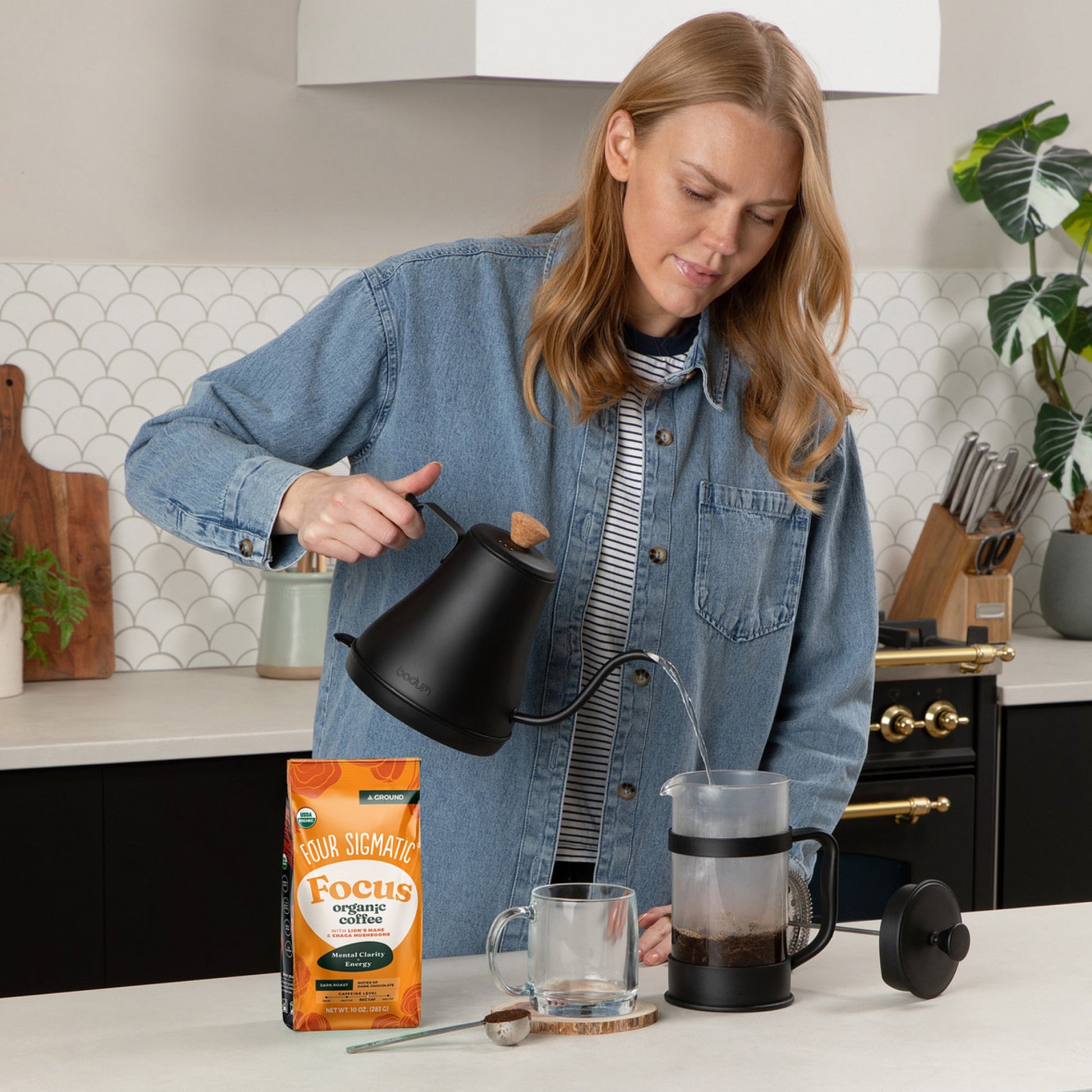 focus-ground-coffee-dark-h4 Focus_Ground_Chaga_10oz_Lifestyle_2.jpg